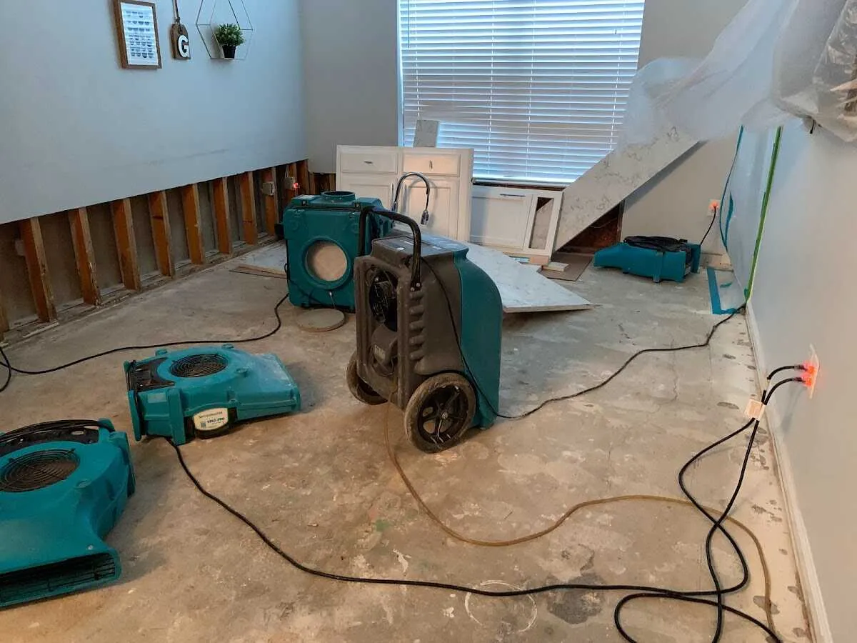 Dehumidifier in flood-cut room for Water Damage Restoration in Winchester